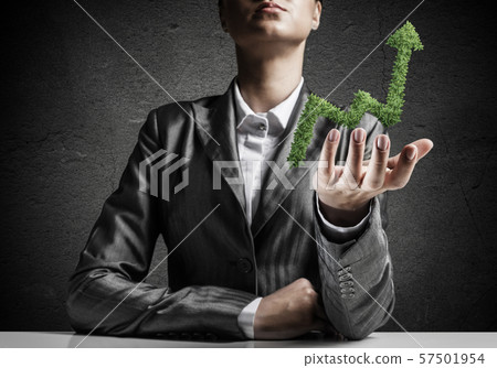 Businessman presenting growing graph. Businessman presenting growing graph. 57501954