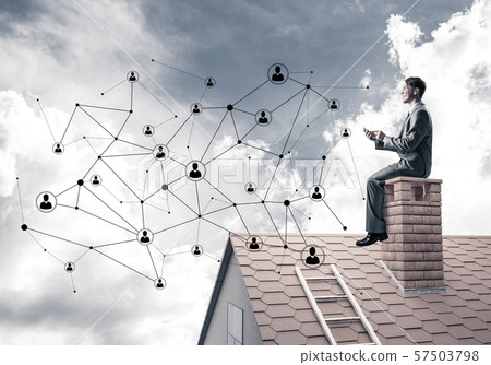 Businessman or student on brick roof and concept of social conne 57503798