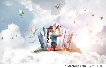 Concept of careless happy childhood with girl looking in future Concept of careless happy childhood with girl looking in future 57504100