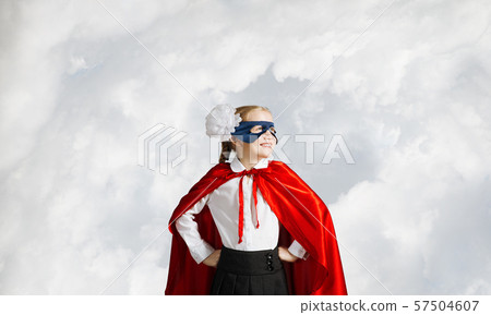 Girl power concept with cute kid guardian against sky background 57504607