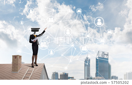 Concept of security and privacy protection with camera headed woman Concept of security and privacy protection with camera headed woman 57505202