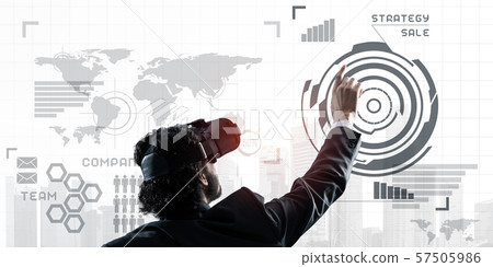 Experiencing virtual reality as new concept in technologies for business. Mixed media Experiencing virtual reality as new concept in technologies for business. Mixed media 57505986