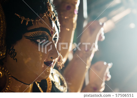 Close up side view face of Goddess Maa Durga Idol. 57506551