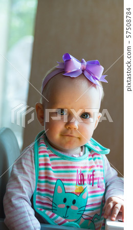 Curious look of the child in one year Curious look of the child in one year 57508784