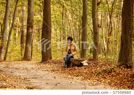 Hipster girl in a park 57508980