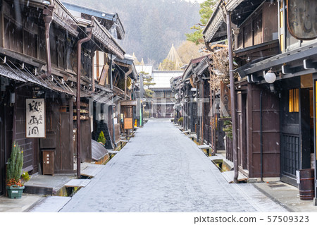 Takayama old town with snow falling in Gifu, Japan 57509323