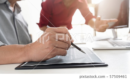 Programmer working in a software development and Programmer working in a software development and 57509461