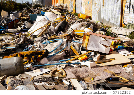 garbage illegally dumped in an open dump 57512392