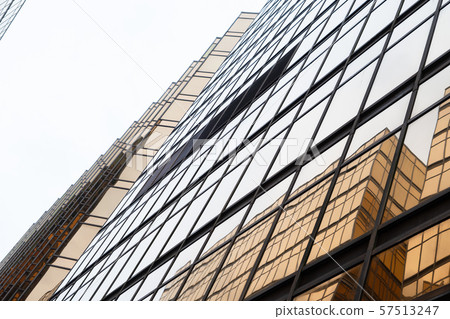 Golden building. Windows glass of modern office 57513247