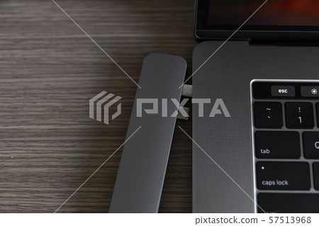 The USB adapter under the Type-C connector for laptop. Multiport station for laptop with multiple The USB adapter under the Type-C connector for laptop. Multiport station for laptop with multiple 57513968