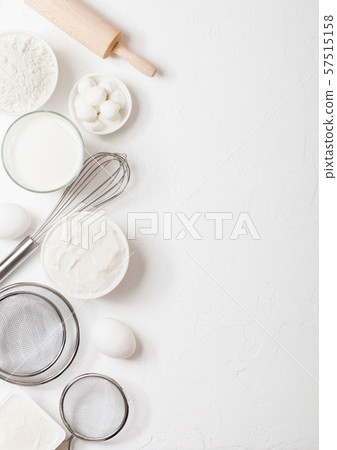 Fresh dairy products on white table background. Fresh dairy products on white table background. 57515158