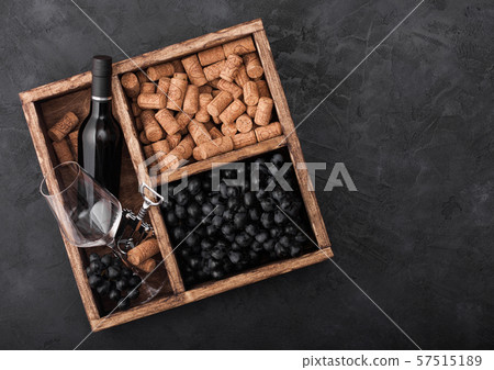 Luxury bottle of red wine and empty glass with 57515189