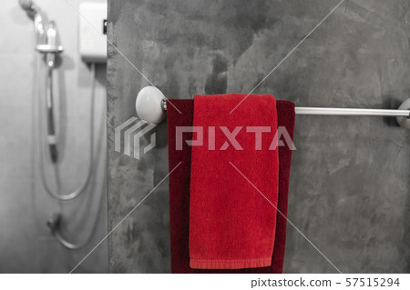 One red towel in bathroom on a dryer. Counter bathroom interior contemporary. Luxury and stylish One red towel in bathroom on a dryer. Counter bathroom interior contemporary. Luxury and stylish 57515294
