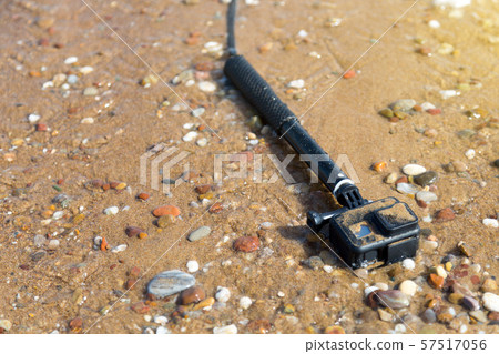 Action camera with a mini tripod. Action camera with a mini tripod. 57517056