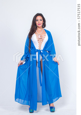 Pretty woman posing in bathrobe 57517535