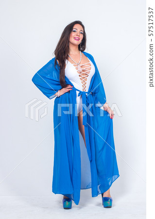 Pretty woman posing in bathrobe 57517537