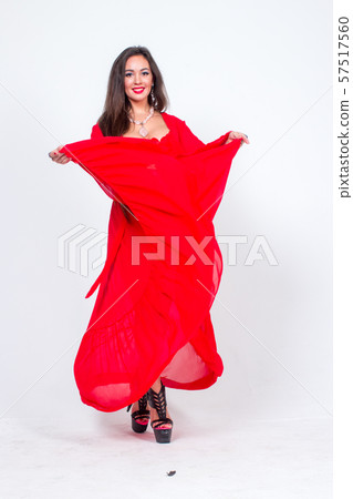 Pretty woman posing in bathrobe 57517560