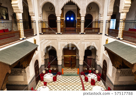 MARRAKESH, MOROCCO - JAN 2019: Moroccan architecture traditional arabian design - Rich Riyad patio MARRAKESH, MOROCCO - JAN 2019: Moroccan architecture traditional arabian design - Rich Riyad patio 57517788