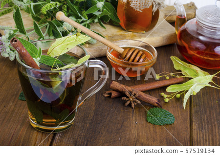 Herbal tea with mint, dried linden flowers Herbal tea with mint, dried linden flowers 57519134