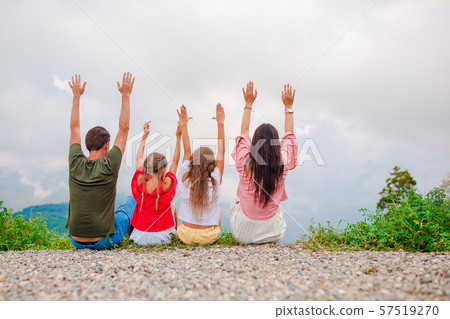 Beautiful happy family in mountains in the background of fog 57519270