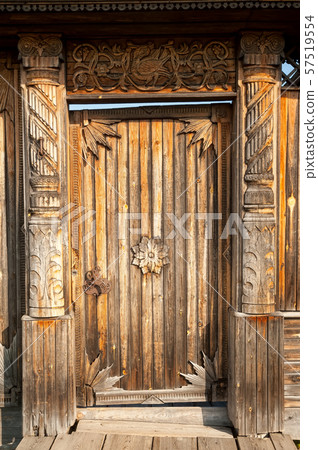 wooden door with iron handles 57519554