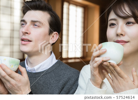 Man and woman drinking tea Man and woman drinking tea 57524614