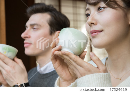 Man and woman drinking tea 57524619
