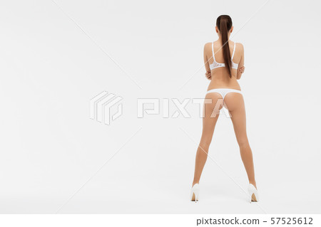 Erotic model in lingerie and high heels Erotic model in lingerie and high heels 57525612