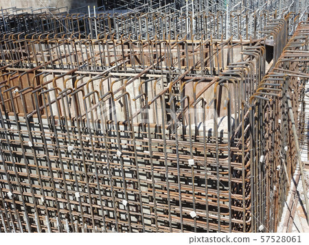 Steel reinforcement bar and timber formworks at construction site. Steel reinforcement bar and timber formworks at construction site. 57528061