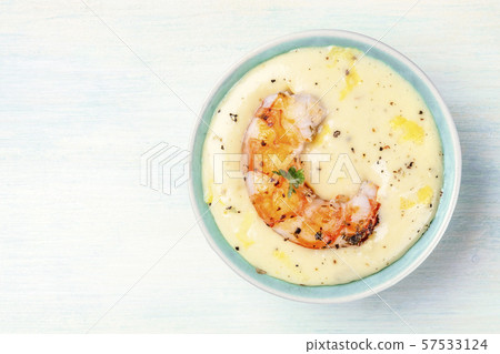 A shrimp with a dip, a seafood appetizer, shot from the top with copyspace 57533124