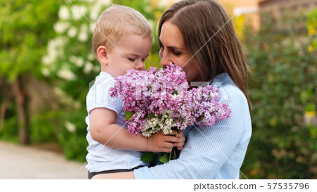 Mom and son for a walk 57535796
