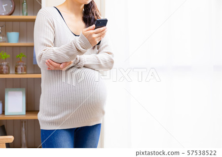 Pregnant woman 57538522