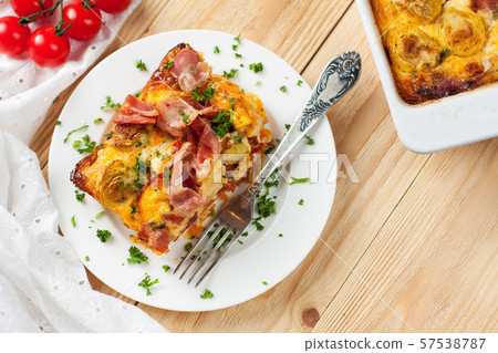 Casserole with sweet potatoes, brussel sprouts, bacon Casserole with sweet potatoes, brussel sprouts, bacon 57538787