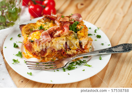 Casserole with sweet potatoes, brussel sprouts, bacon 57538788