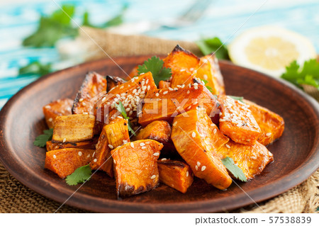 Roasted sweet potatoes with sesame 57538839