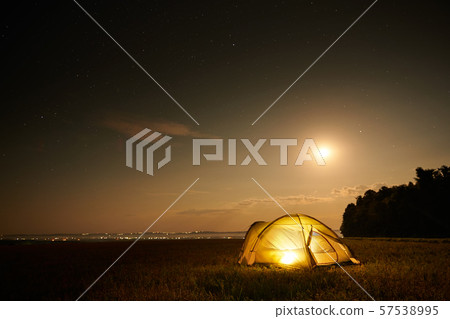 Traveling and camping concept - camp tent at night 57538995
