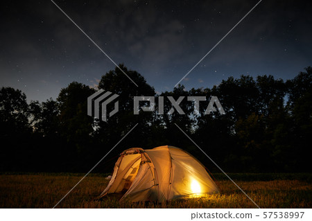 Traveling and camping concept - camp tent at night 57538997