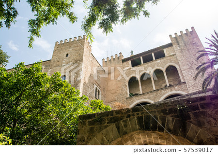 Mallorca stone castle tower and ramparts 57539017