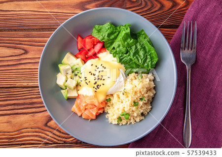 Vegetable buddha bowl lunch with salmon, feta cheese, couscous 57539433