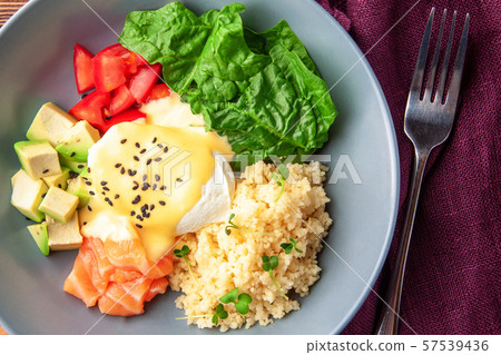 Vegetable buddha bowl lunch with salmon, feta cheese, couscous 57539436