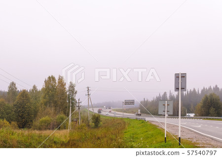 highway in autumn foggy terrain highway in autumn foggy terrain 57540797