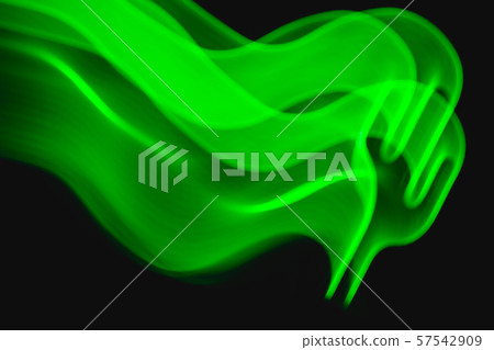 Neon green cactus LED lamp in motion. Blur pattern 57542909
