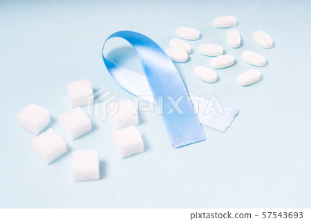 Sugar on blue background Sugar on blue background 57543693