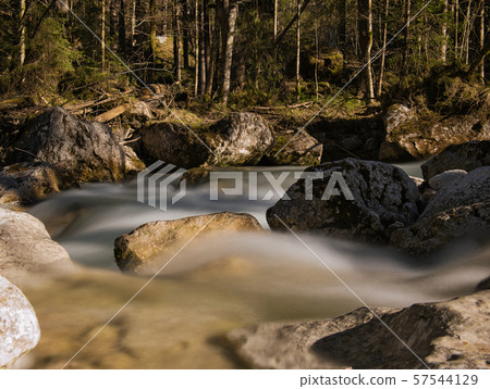 Long-term exposure of a stream with rocks 57544129