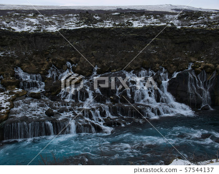 The Watercourse of the Hraunfossar waterfall The Watercourse of the Hraunfossar waterfall 57544137