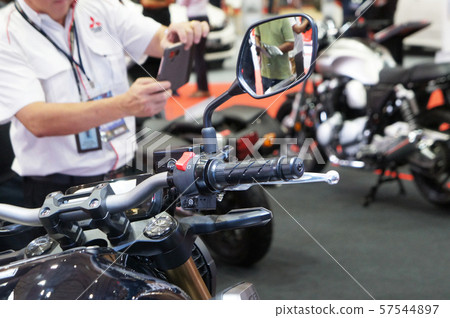 Selective focused on the high performance motorcycle handle bar and all the equipment attached to it.   57544897