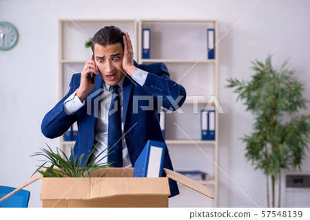 Young employee being made redundant Young employee being made redundant 57548139