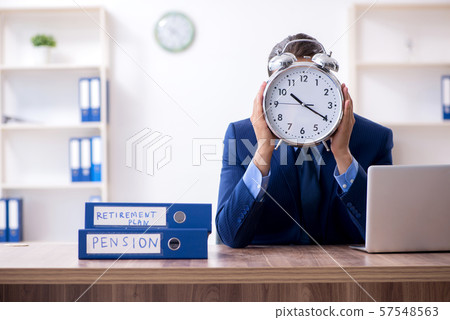 Young male accountant working in the office 57548563
