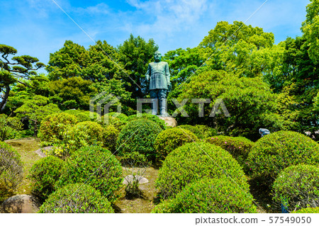 Sightseeing spots in Kagoshima: A statue of Takamori Saigo, a hero of the region and a representative of the Meiji Restoration (backed by Shiroyama and the blue sky) Sightseeing spots in Kagoshima: A statue of Takamori Saigo, a hero of the region and a representative of the Meiji Restoration (backed by Shiroyama and the blue sky) 57549050