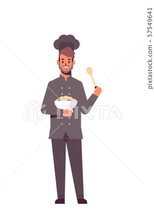 male professional chef cook holding plate and spoon man restaurant worker in uniform tasting dish male professional chef cook holding plate and spoon man restaurant worker in uniform tasting dish 57549641